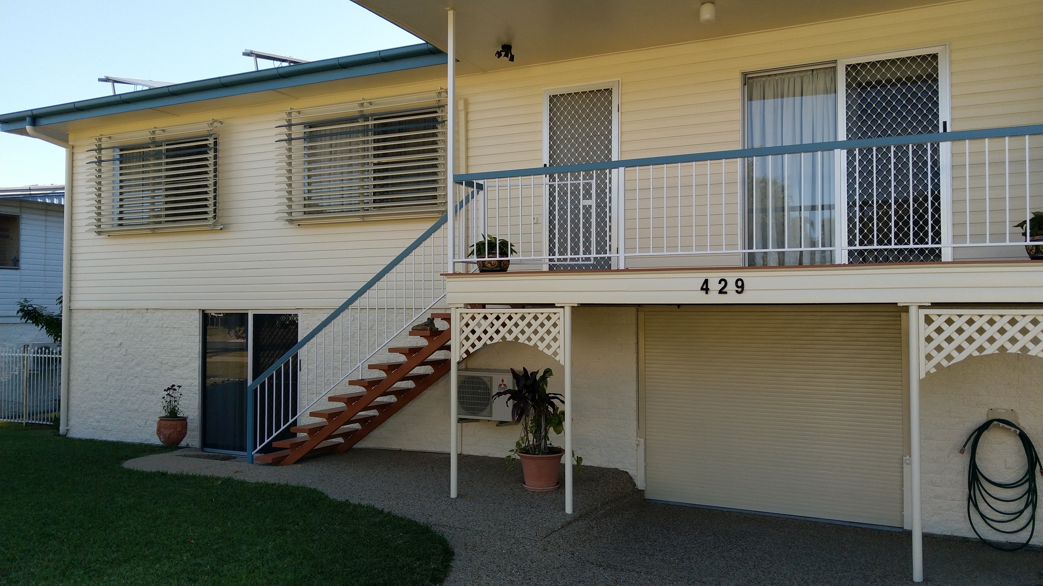 Two Story with Blue Balcony